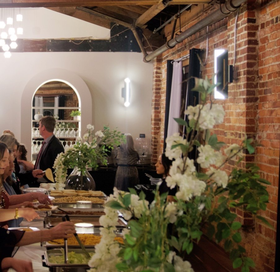 Corporate event catering buffet with taco bar and fresh ingredients